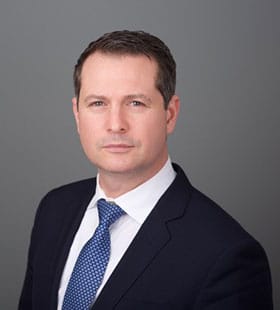 Headshot of Adam C. Ford